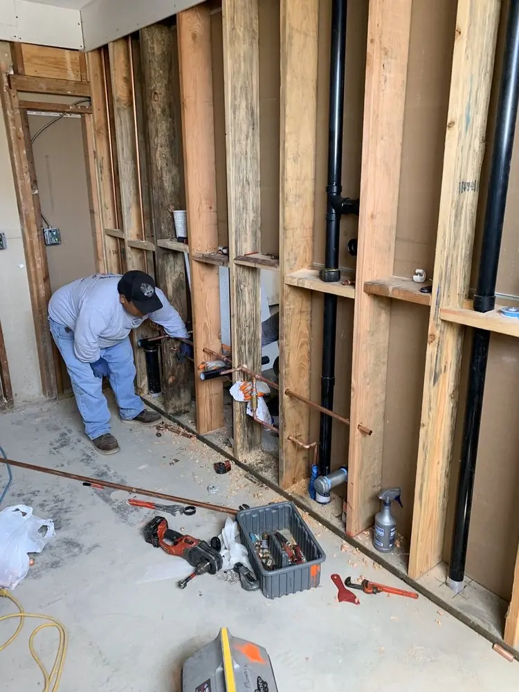 Commercial rough-in plumbing for Water Heater Replacement in Woodley Hills